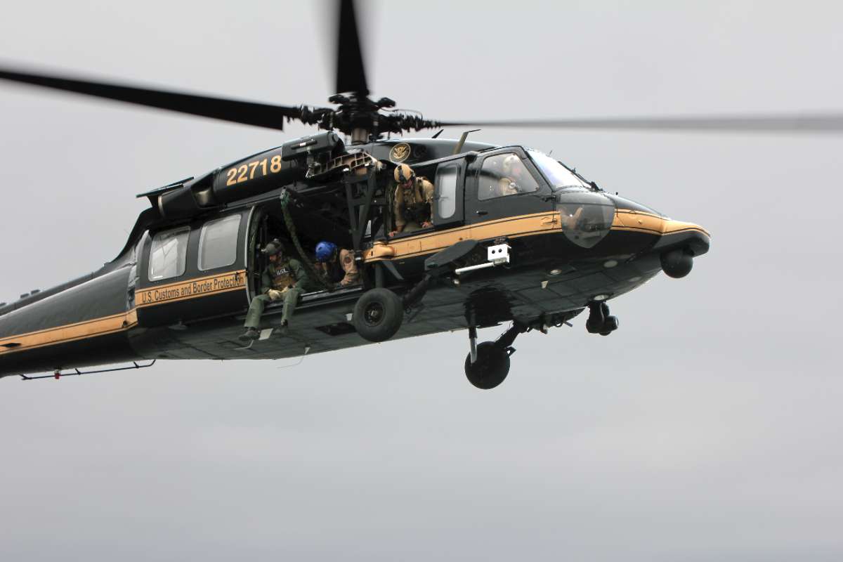 ICE Agents Rappel From Black Hawk Helicopters in Chicago Raid
